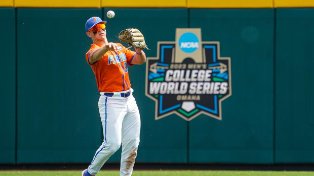 Jun 21, 2023; Omaha, NE, USA; Florida Gators center fielder Wyatt Langford (36) throws the ball after making a catch for an out against the TCU Horned Frogs during the sixth inning at Charles Schwab Field Omaha. Mandatory Credit: Dylan Widger-USA TODAY Sports